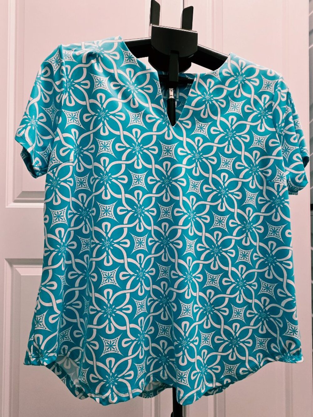 LuLu B Blue Geometric Print Pull Over Asymmetrical Top